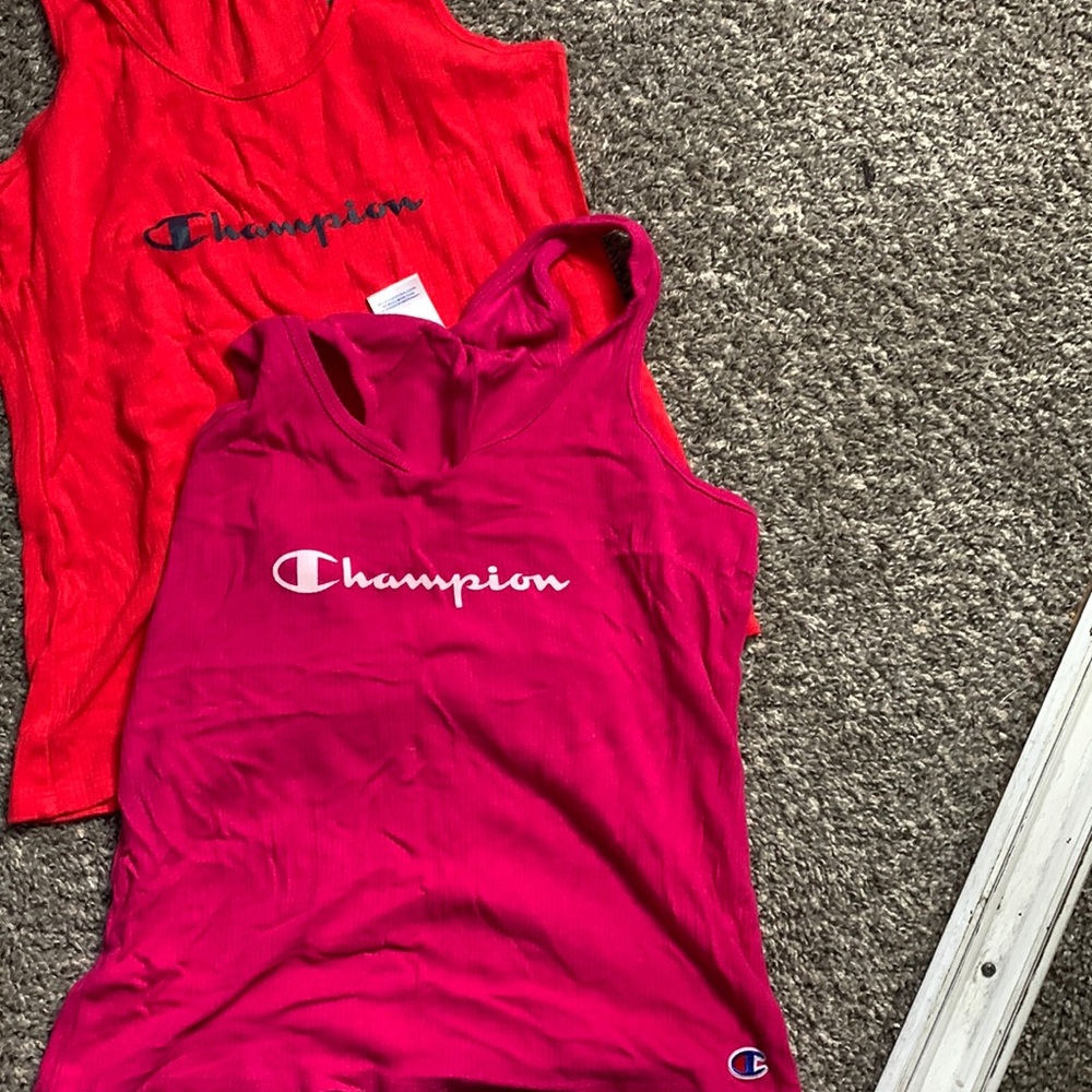 two champion shirts, worn once